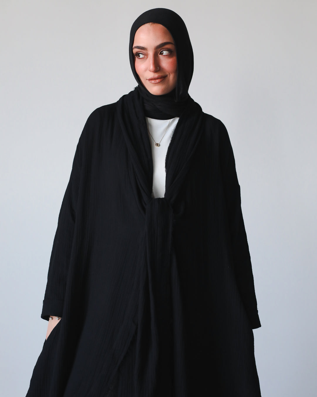The Breezy Flow Muslin Cardigan in Black