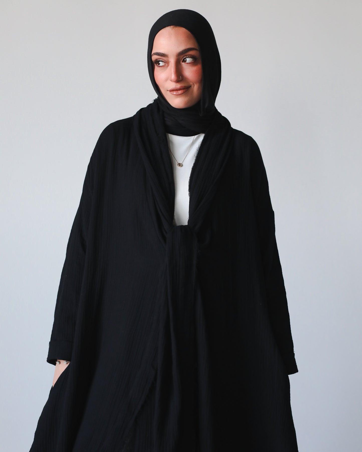 The Breezy Flow Muslin Cardigan in Black