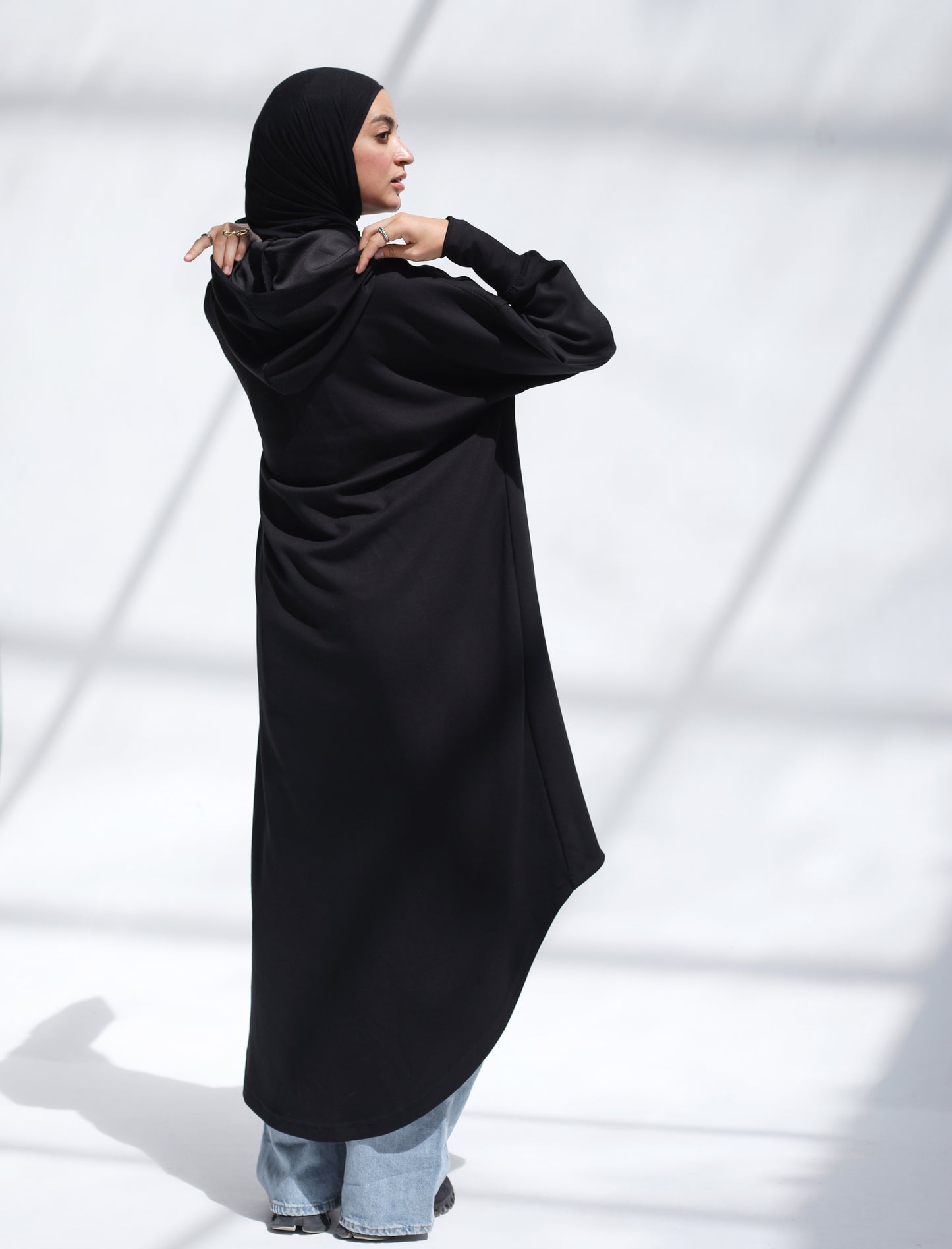 Urban Move Hoodie In Warm Black