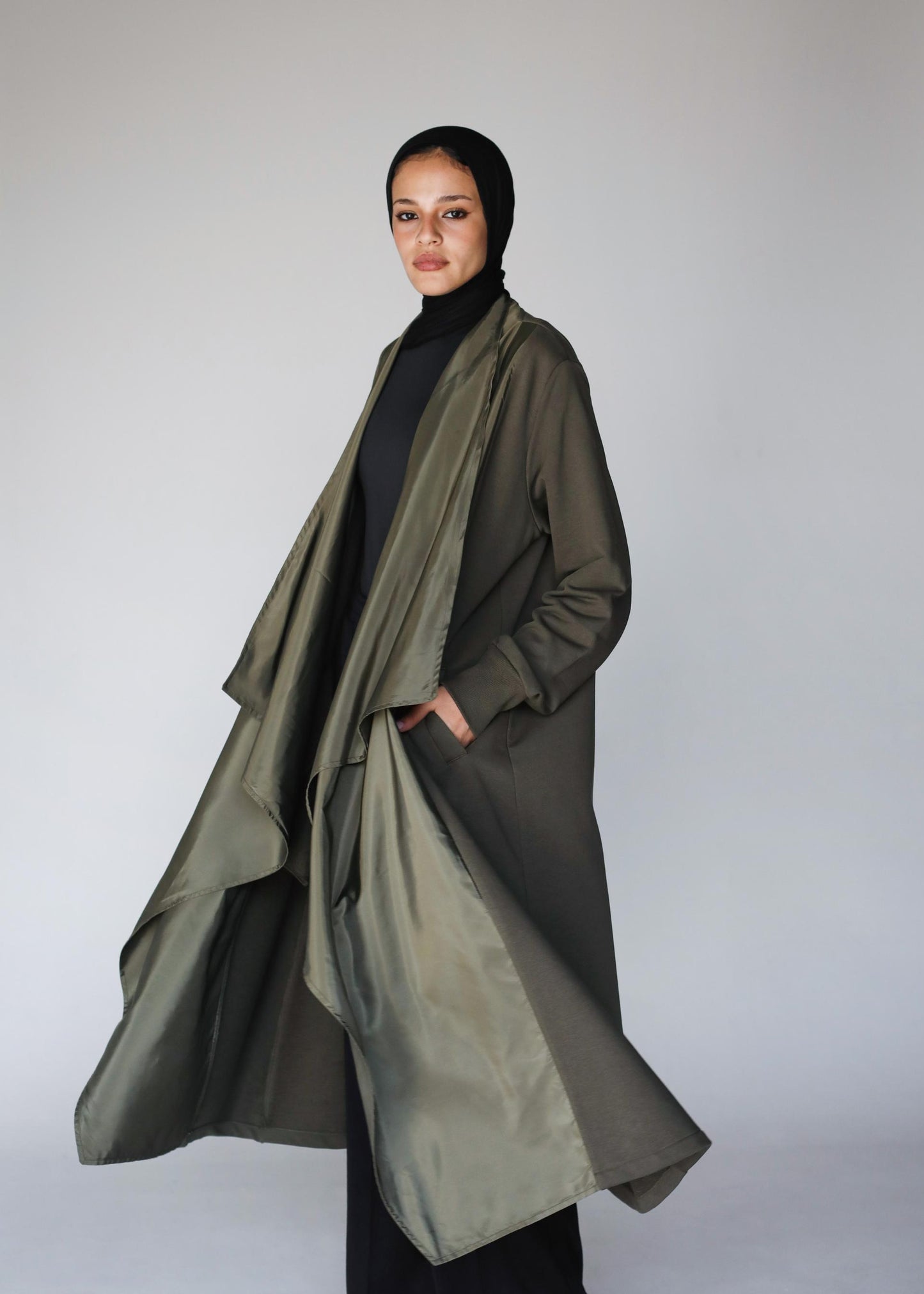 The Flowline Cardigan In Olive Oil